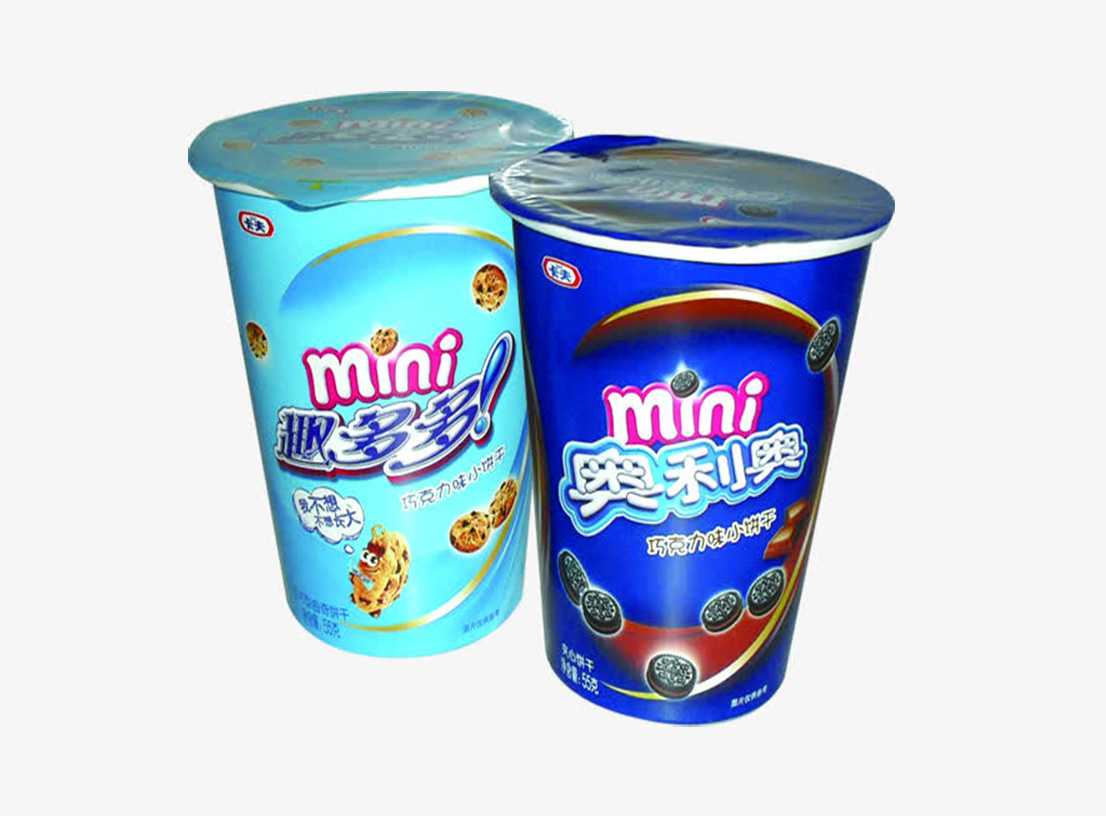 高效封口解決方案——全自動(dòng)開心零食桶灌裝封口機(jī)，助力食品企業(yè)量產(chǎn)升級(jí)