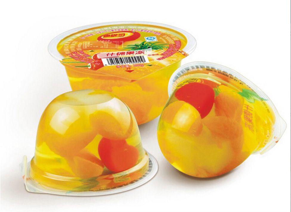 全自動(dòng)果凍灌裝封口機(jī):重塑杯裝果凍智造效率新標(biāo)桿